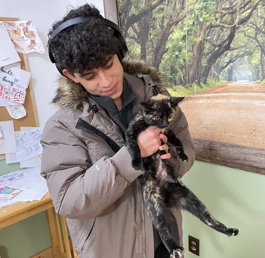 Jared holding a cat